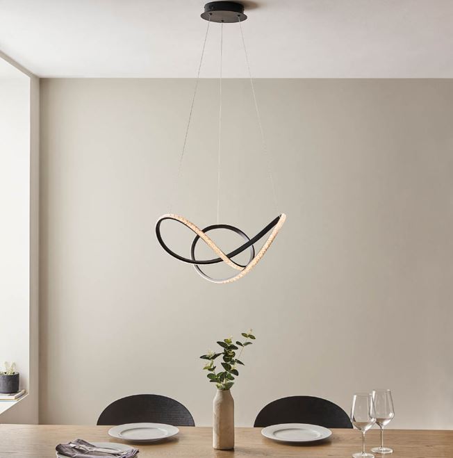 Textured black pendant with clear faceted detail